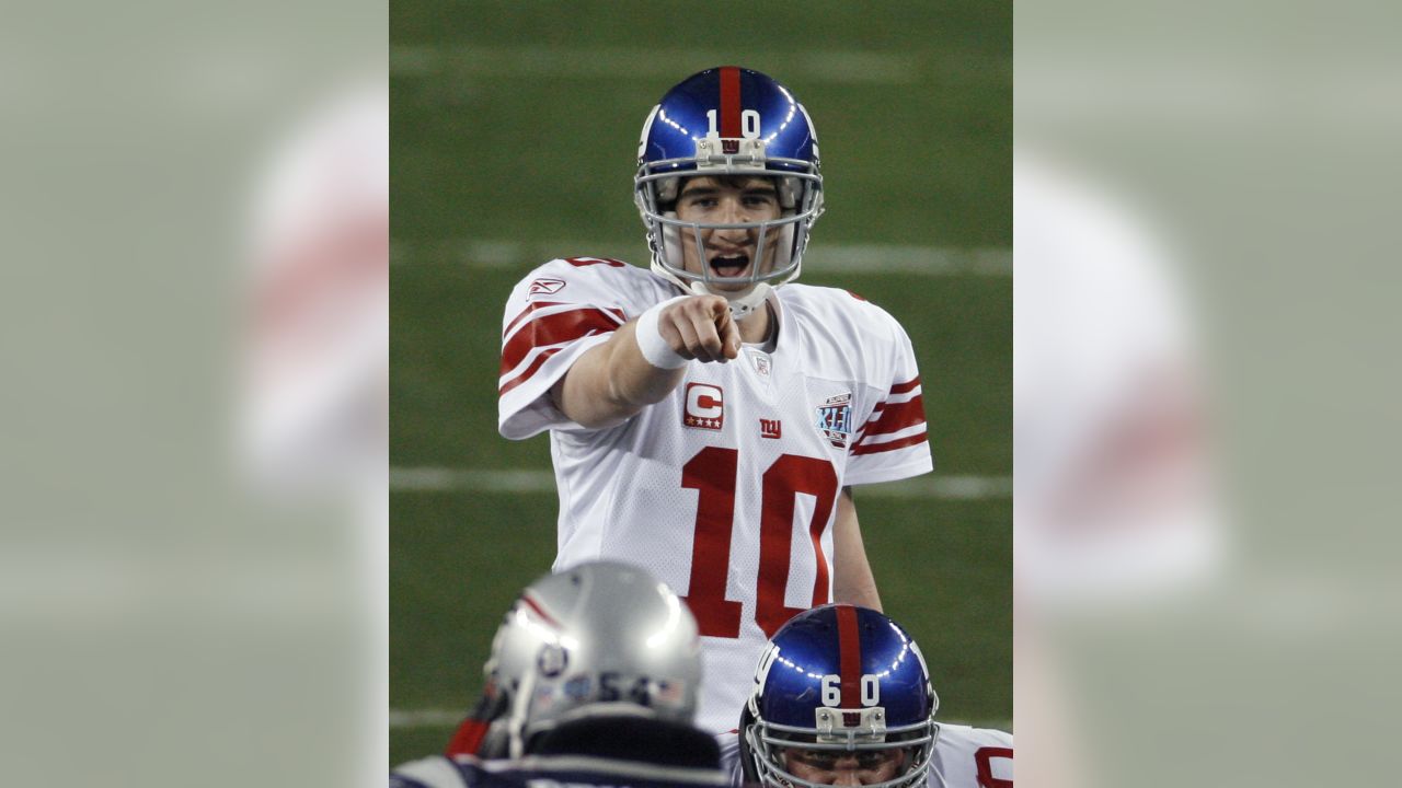 The New England Patriots' Randy Moss (81) can't pull in a pass against the  New York Giants' Corey Webster (23) in a 17-14 Giants victory in Super Bowl  XLII at University of