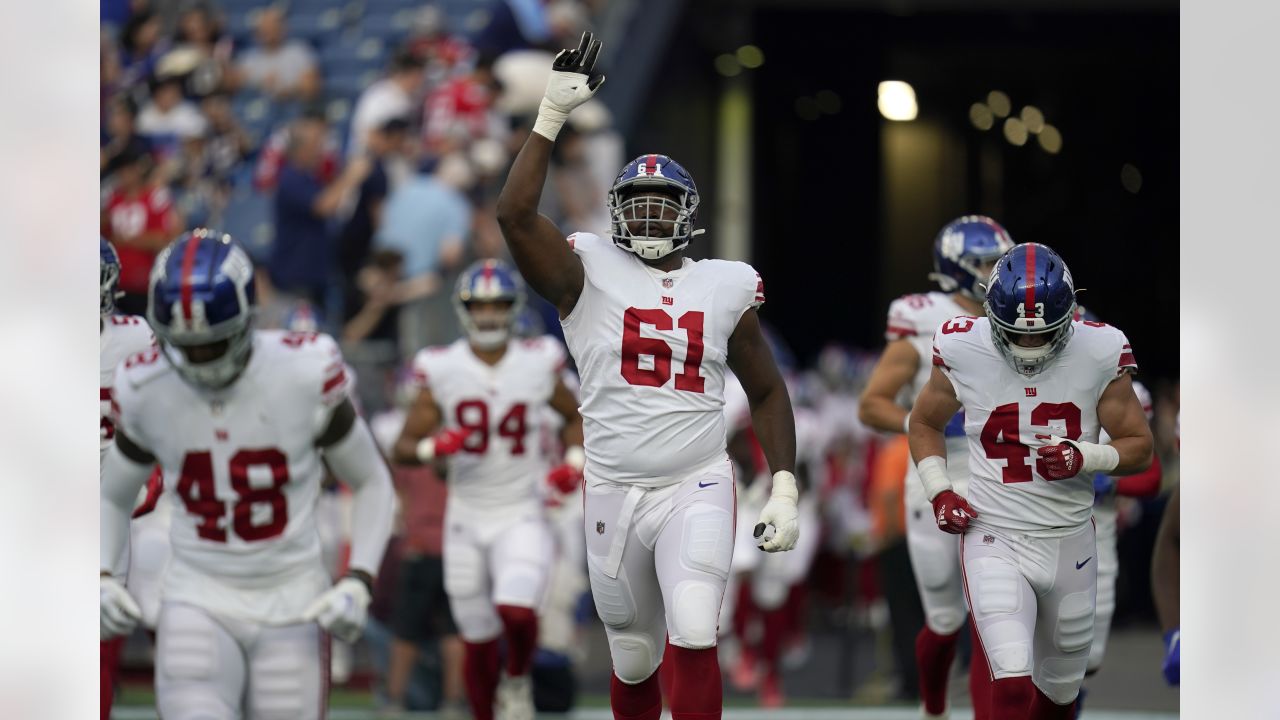 New York Giants offensive tackle Roy Mbaeteka (61) on the sideline during  the first half of an NFL football game against the New York Giants,  Thursday, Aug. 11, 2022, in Foxborough, Mass. (