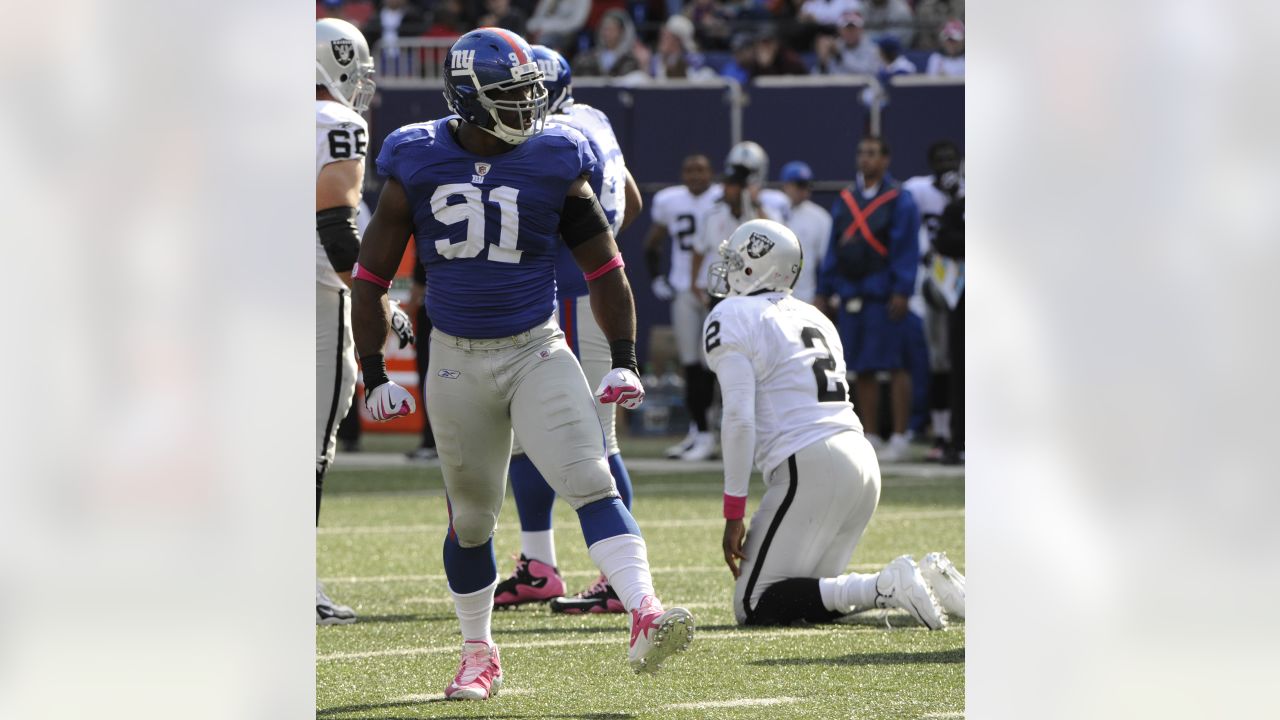 Oakland Raiders quarterback JaMarcus Russell runs out of the pocket in the  second quarter against the New York Giants in week 5 of the NFL season at  Giants Stadium in East Rutherford