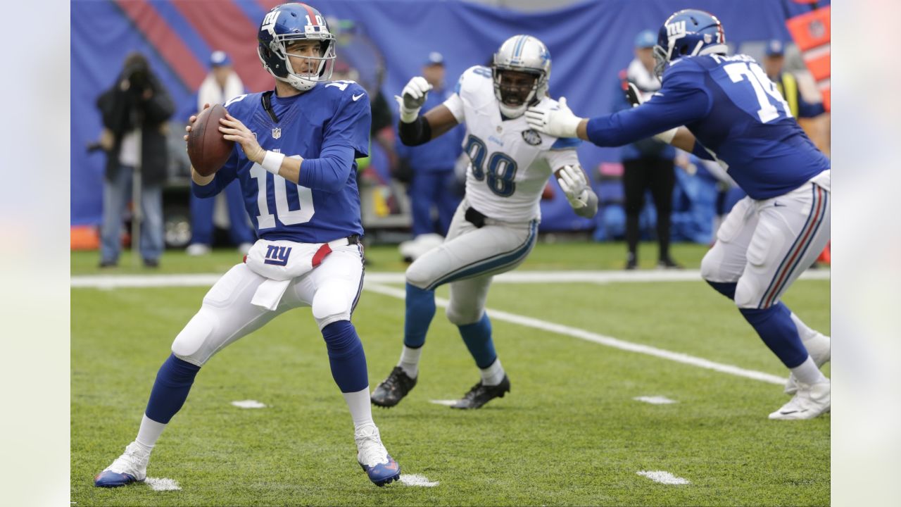 East Rutherford, NJ. 18/12/2022, Detroit Lions wide receiver Amon-Ra St.  Brown (14) makes a catch during a NFL game against the New York Jets on  Sunday, Dec. 18, 2022 in East Rutherford