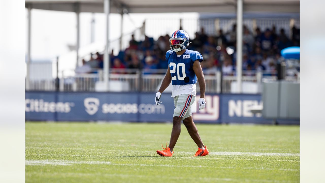 New York Giants cornerback Julian Love (37) tackles New England