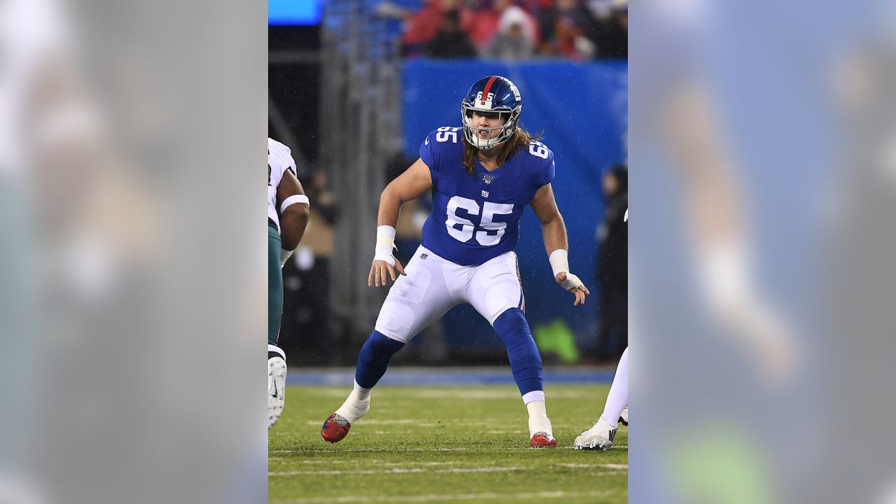 New York Giants offensive guard Nick Gates (65) looks to block