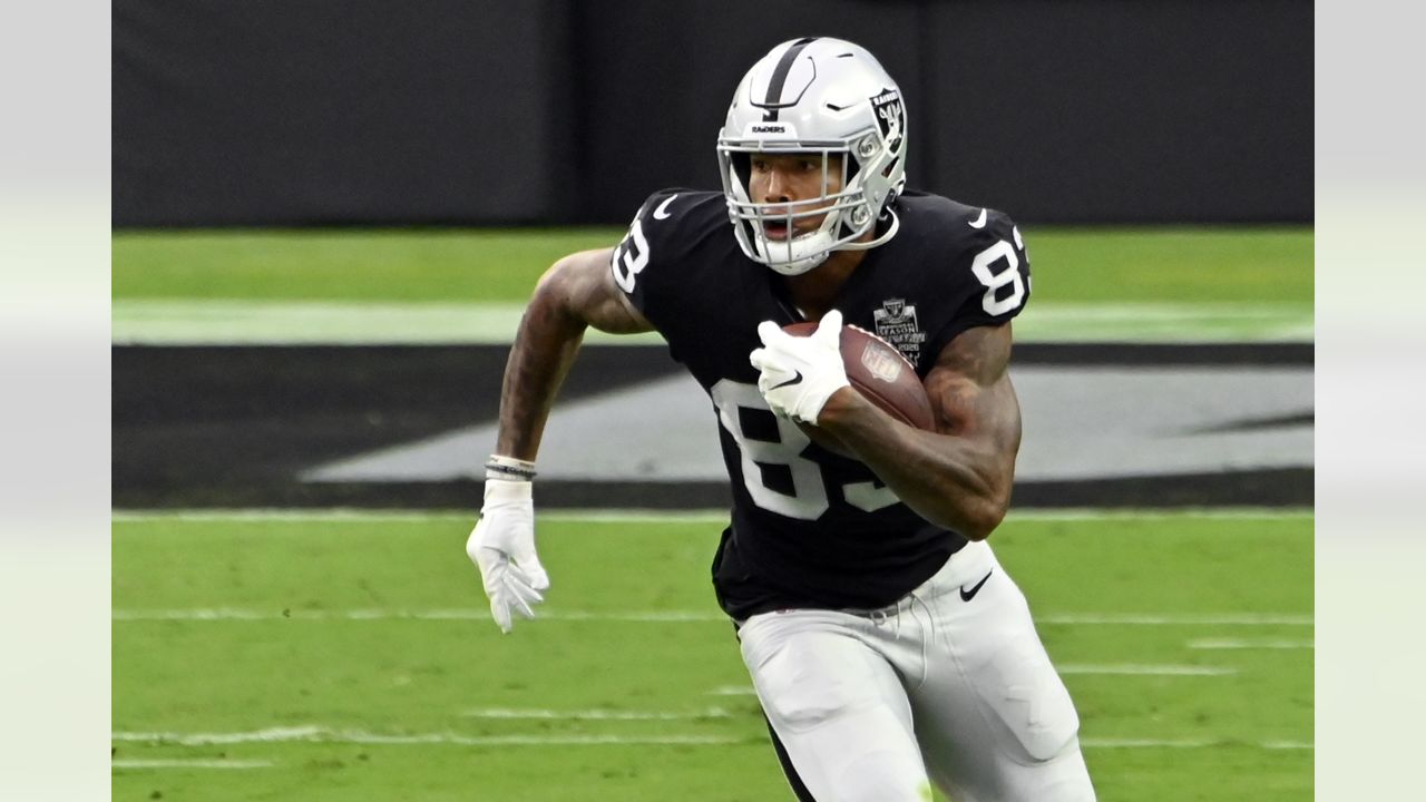 Oakland Raiders tight end Darren Waller runs the ball during an