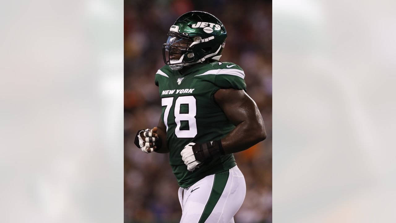 New York Giants offensive lineman Jonotthan Harrison takes the field to  face the Atlanta Falcons before an NFL football game, Sunday, Sept. 26, 2021,  in East Rutherford, N.J. (AP Photo/Adam Hunger Stock