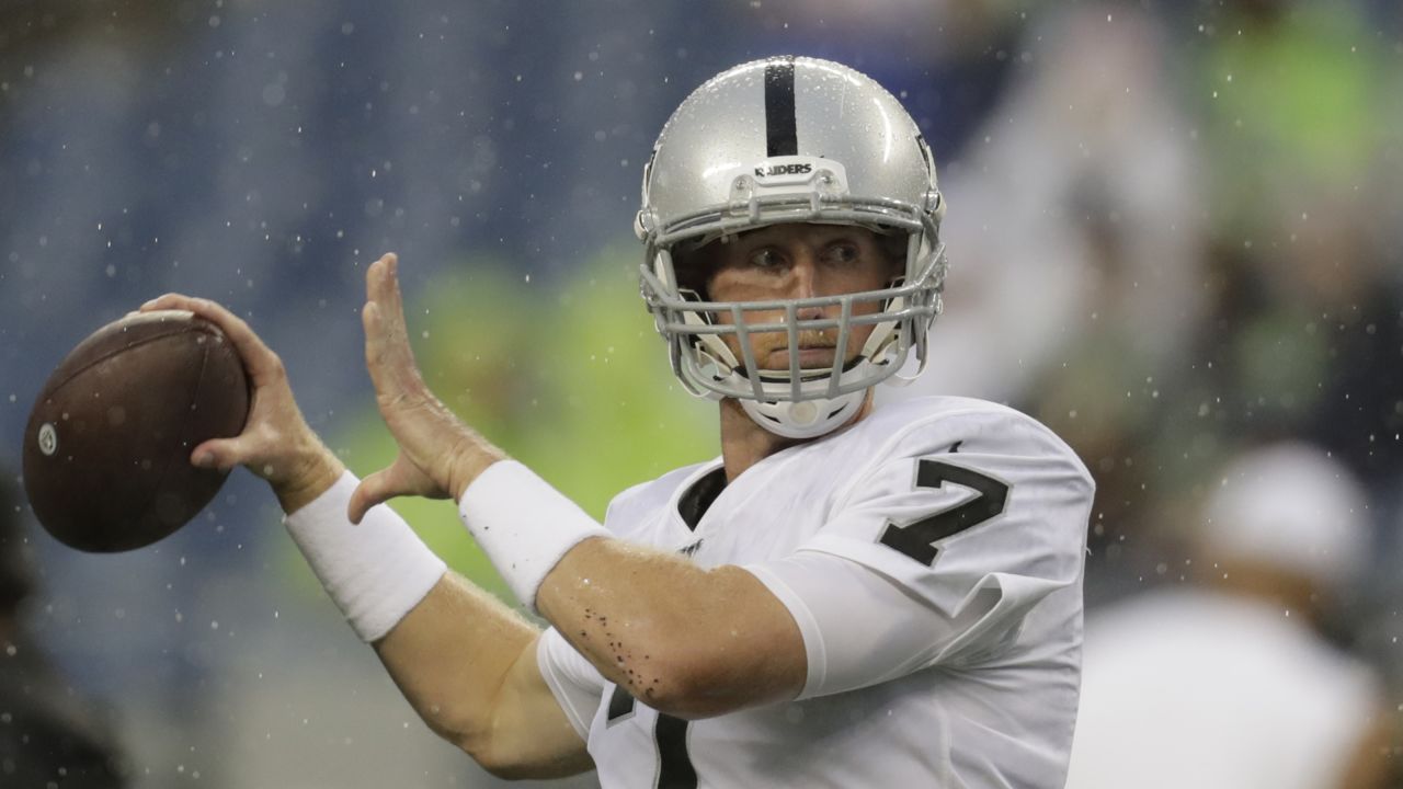 Oakland Raiders quarterback Mike Glennon (7) calls a play from the huddle  during the second hal …