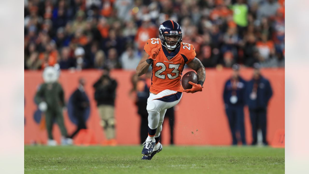 Denver running back Devontae Booker runs down field to the Oakland 25-yard  line during the second quarter Sunday, Jan. 1, 2017, at Sports Authority  Field at Mile High in Denver. (The Gazette