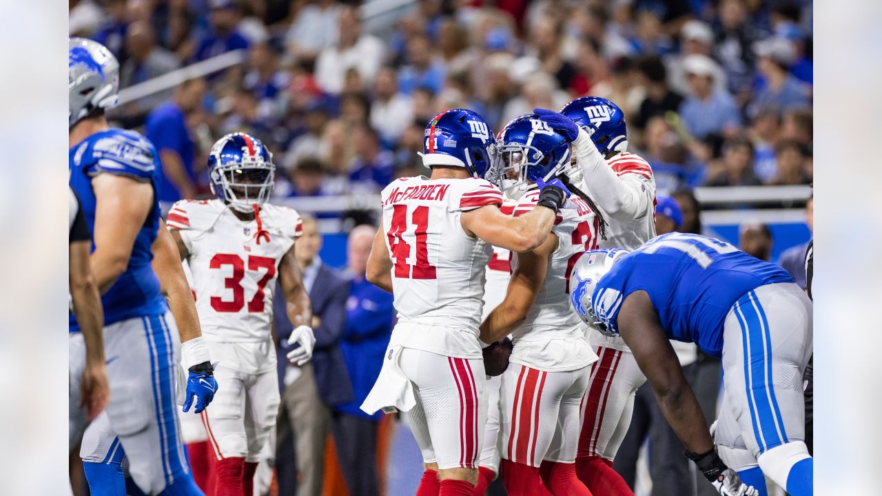 New York Giants safety Dane Belton (24) and linebacker Tomon Fox