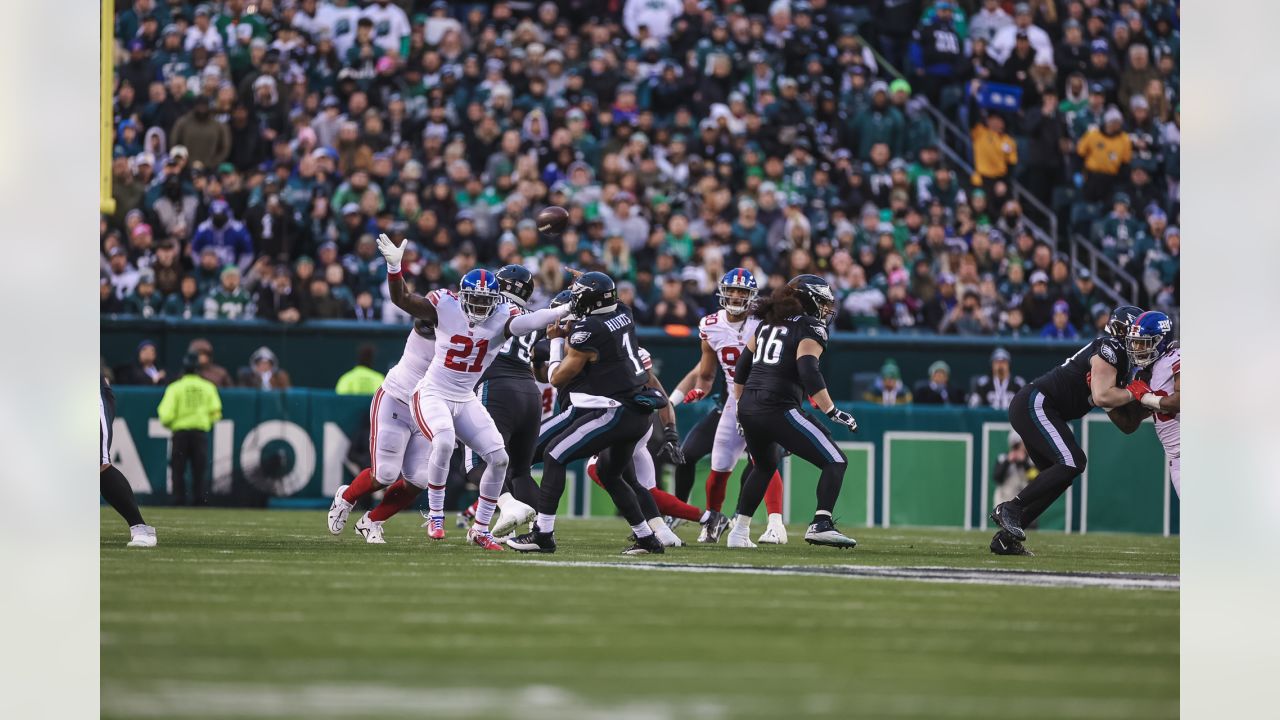 New York Giants Trumaine McBride leaps and reaches for the football as  Philadelphia Eagles DeSean Jackson catches a 56 yard reception in the  second quarter in week 5 of the NFL season