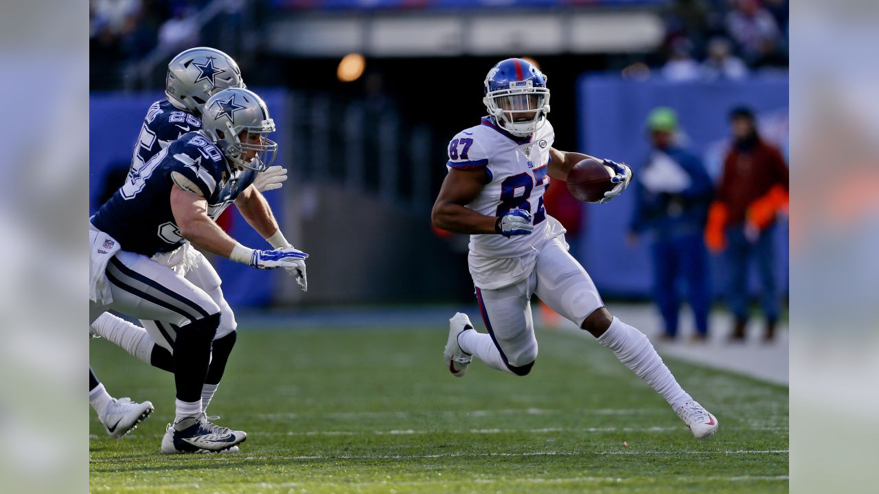 New York Giants wide receiver Sterling Shepard (87) celebrates with his  team after a 3-yard touchdown reception over the Washington Redskins during  the first half of an NFL game at FedEx Field