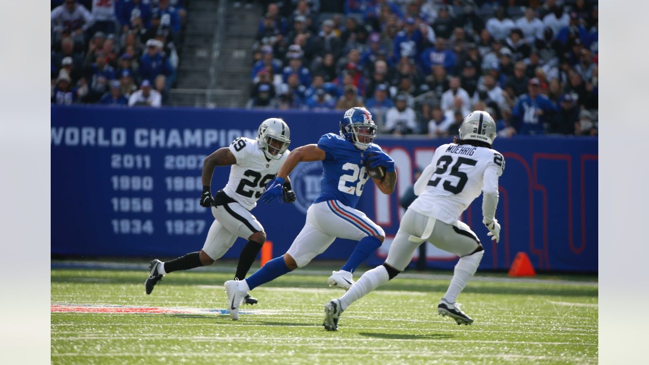 New York Giants fullback Elijhaa Penny (39) and defensive back Steven  Parker (38) react after a defensive play against the Washington Football  Team during the first quarter of an NFL football game, Sunday, Jan. 9,  2022, in East Rutherford, N.J. (AP Pho