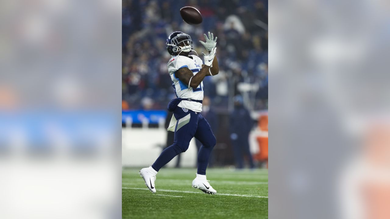 Tennessee Titans running back Derrick Henry speaks to the media following  an NFL wild-card playoff football game against the New England Patriots,  Saturday, Jan. 4, 2020, in Foxborough, Mass. (AP Photo/Steven Senne