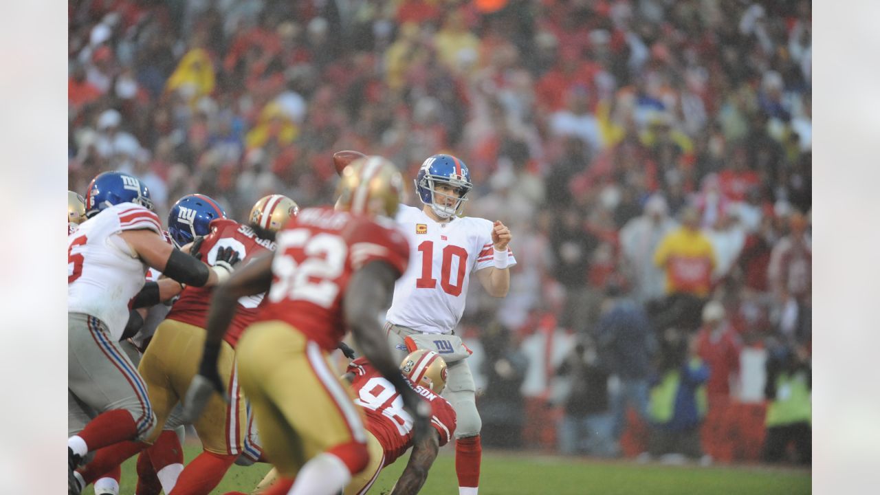 New York Giants Mario Manningham (82) celebrates with Victor Cruz (80)  after catching an Eli Manning pass in the fourth quarter against the San  Francisco 49ers in the NFC Championship at Candlestick