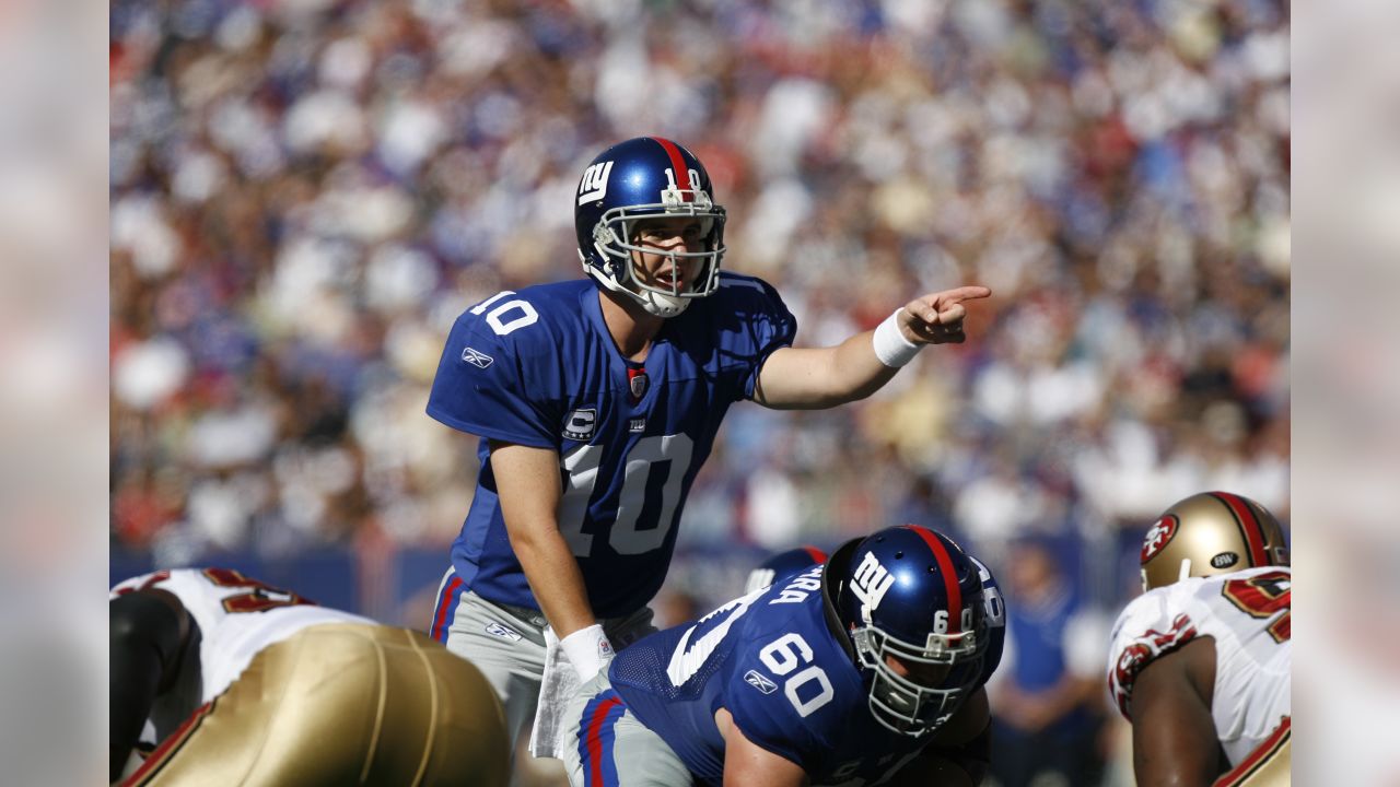 New York Giants quarterback Eli Manning looks confused on the sidelines in  the first quarter. The Atlanta Falcons defeated the New York Giants 14 to 7  at Giants Stadium in East Rutherford