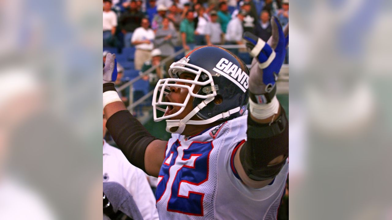 Here's Michael Strahan Holding an Eagles Jersey (and Getting Booed