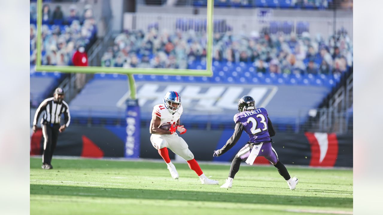 Baltimore, United States. 27th Dec, 2020. New York Giants quarterback  Daniel Jones (8) leaves the field with tight end Kaden Smith (82) after a  game against the Baltimore Ravens at M&T Bank