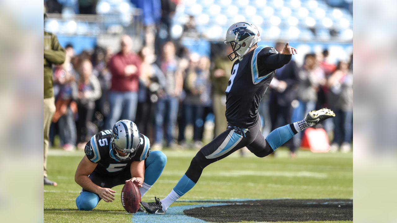 Carolina Panthers' Graham Gano (9) walks to the team's practice