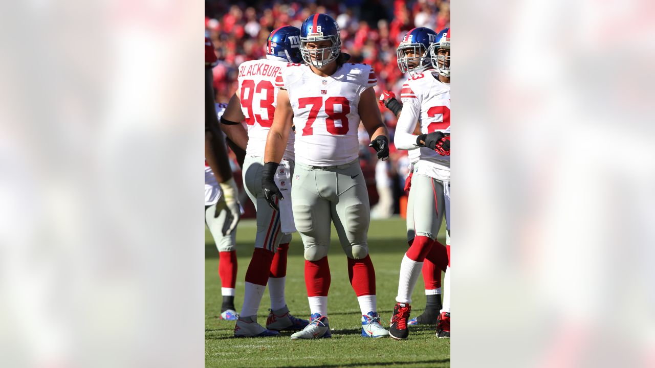 New York Giants defensive tackle Markus Kuhn (78) is fired up after an  interception by a teammate in an NFL football game between the New York  Giants and Dallas Cowboys on Sunday