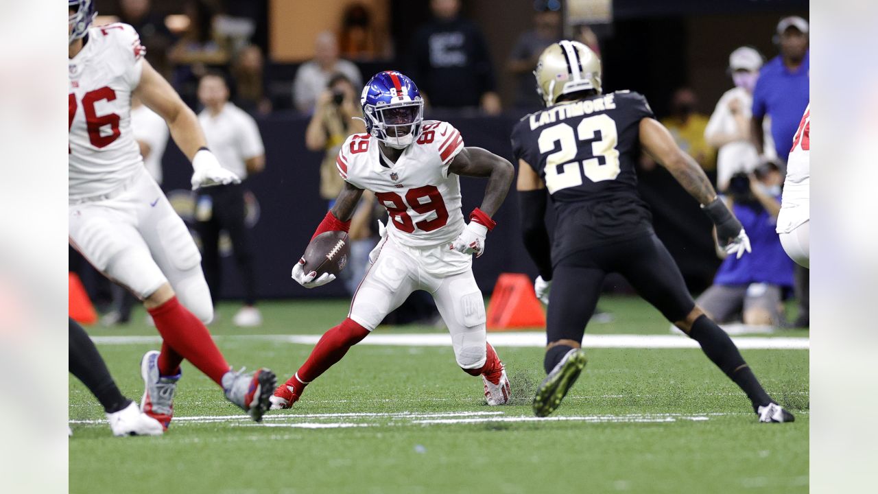 New York Giants running back Gary Brightwell (37) tackles New Orleans  Saints wide receiver Deonte Harris (11) during an NFL football game,  Sunday, Oct. 3, 2021, in New Orleans. (AP Photo/Tyler Kaufman