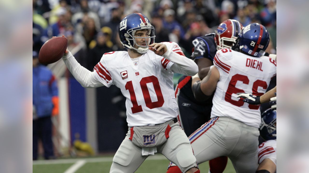 Washington Redskins Andre Carter sacks New York Giants Eli Manning in the  first quarter in week 1 of the NFL season at Giants Stadium in East  Rutherford, New Jersey on September 13