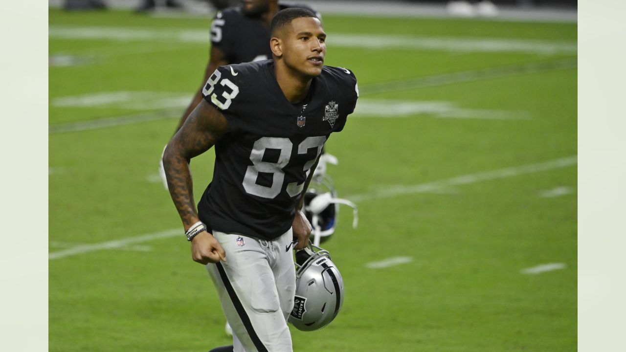 Las Vegas Raiders tight end Darren Waller (83) walks on the field