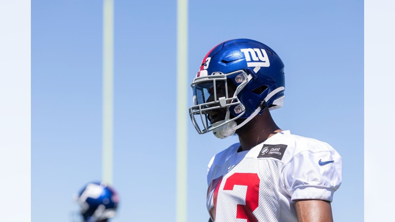 New York Giants tackle Evan Neal #73 walks off the field after their 31-27  loss to the New York Jets in an NFL pre-season football game, Sunday, Aug.  27, 2022, in East