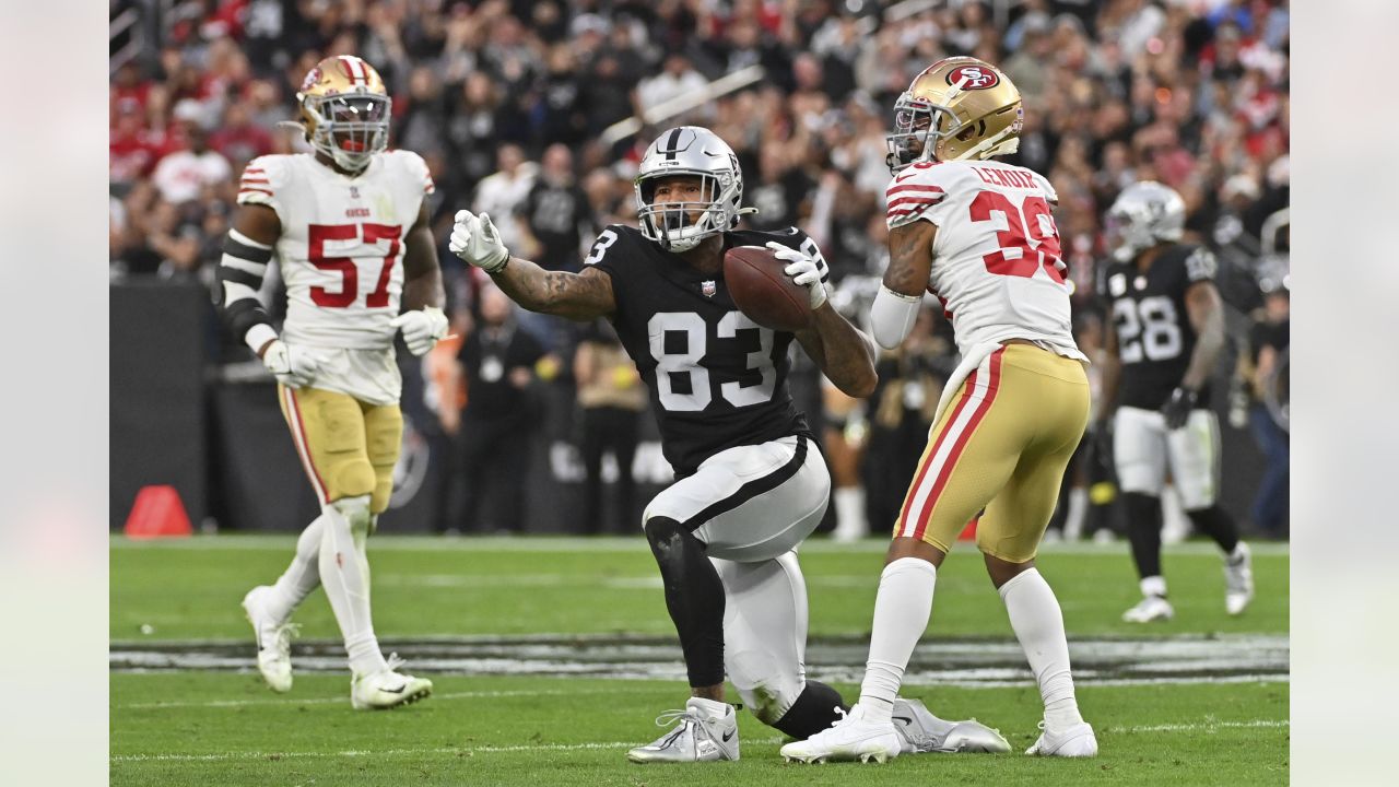 Las Vegas Raiders tight end Darren Waller (83) walks on the field during  the first quarter of a …