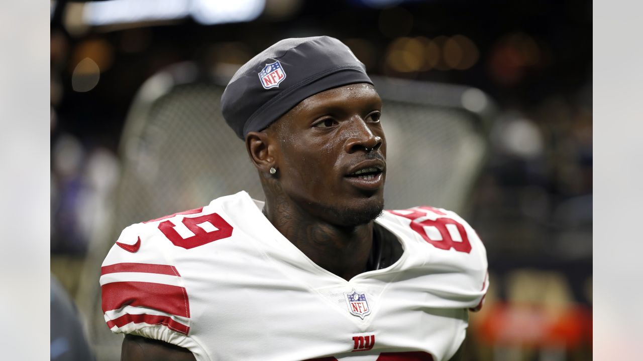 New York Giants running back Gary Brightwell (37) tackles New Orleans  Saints wide receiver Deonte Harris (11) during an NFL football game,  Sunday, Oct. 3, 2021, in New Orleans. (AP Photo/Tyler Kaufman