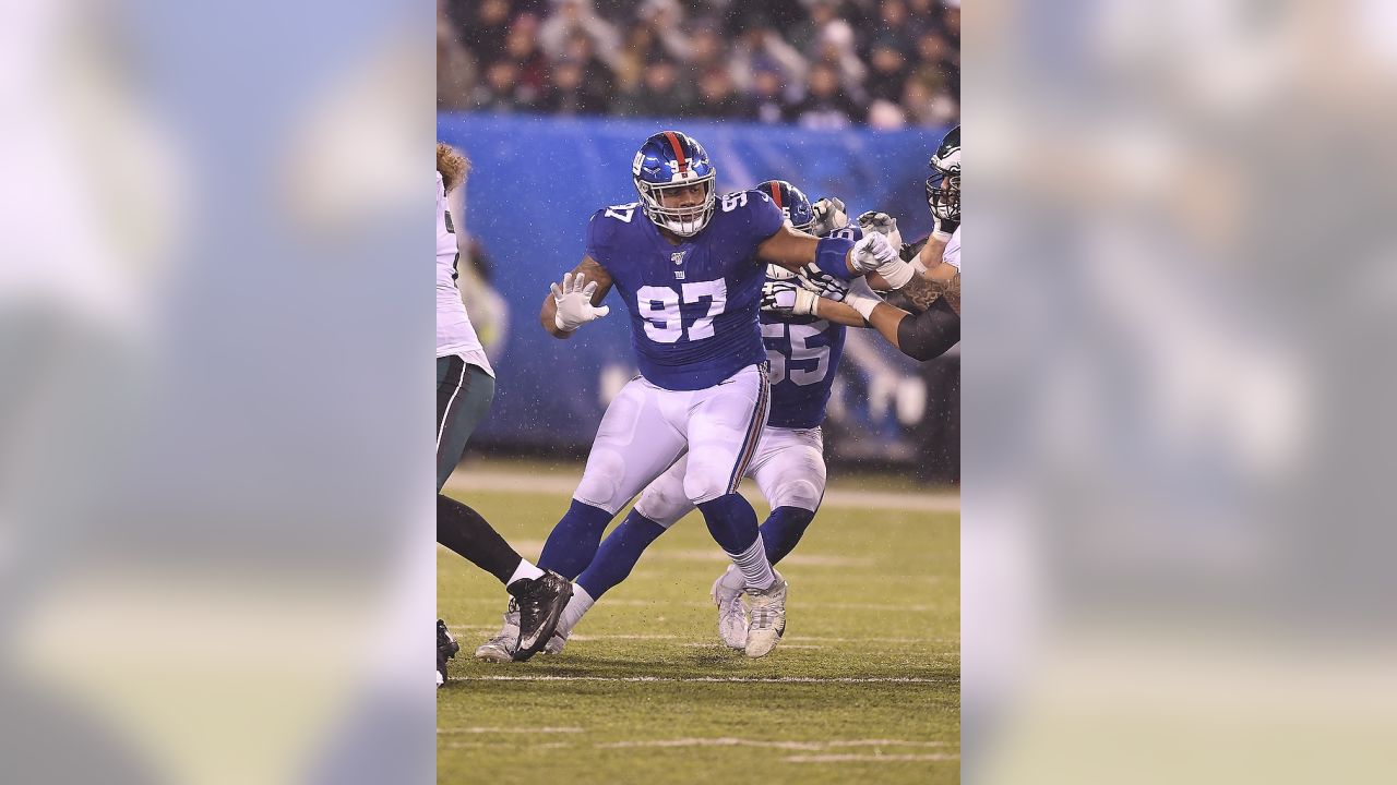 New York Giants defensive tackle Dexter Lawrence (97) takes the field for  an NFL football game against the Philadelphia Eagles on Sunday, Dec. 11,  2022, in East Rutherford, N.J. (AP Photo/Adam Hunger