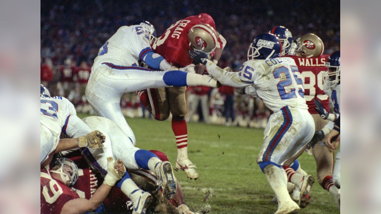 The San Francisco 49ers offensive line meets while play is stopped by a  power outage that plunged Candlestick Park into darkness during Monday  Night Football against the Pittsburgh Steelers in San Francisco