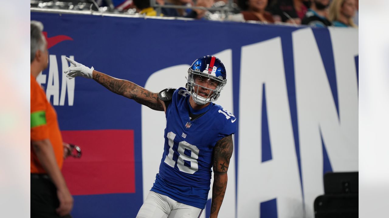 New York Giants wide receiver Collin Johnson (15) throws a shirt to fans  after the NFL football team's practice in East Rutherford, N.J., Friday,  Aug. 5, 2022. (AP Photo/Adam Hunger Stock Photo - Alamy