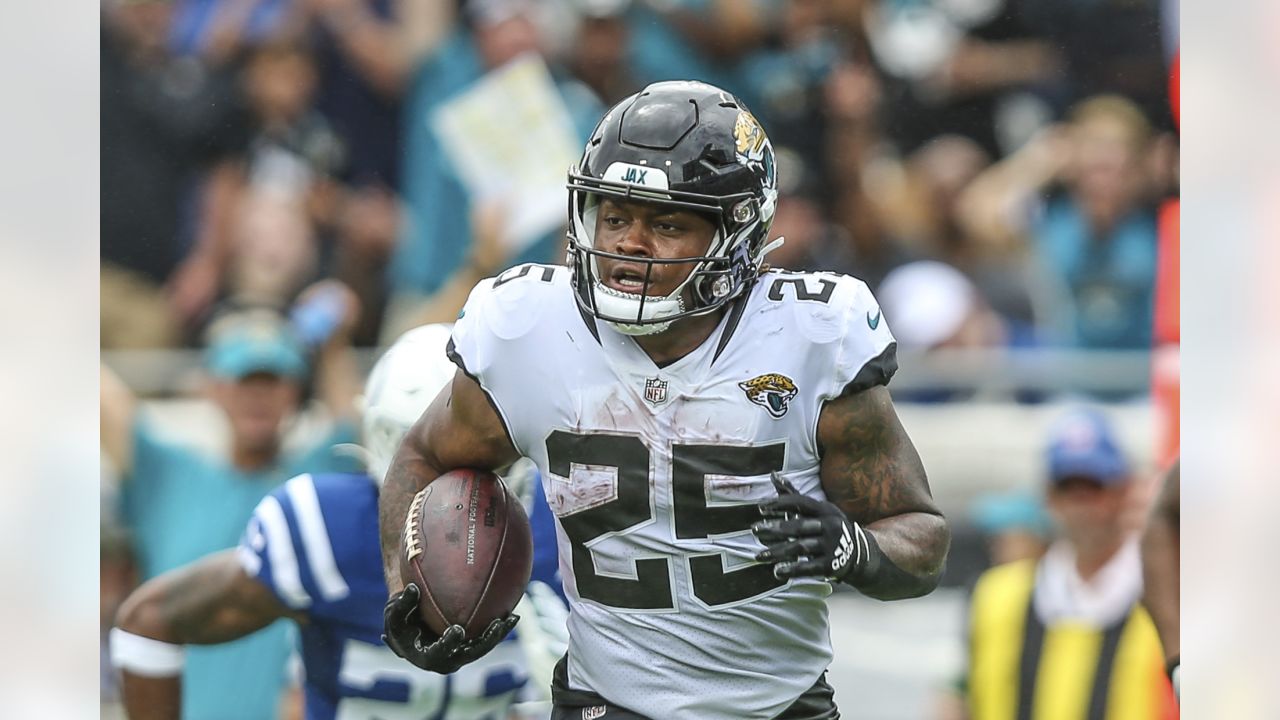 Jacksonville Jaguars running back James Robinson (25) runs the ball for a  touchdown during the first half of an NFL football game against the  Indianapolis Colts, Sunday, Sept. 18, 2022, in Jacksonville