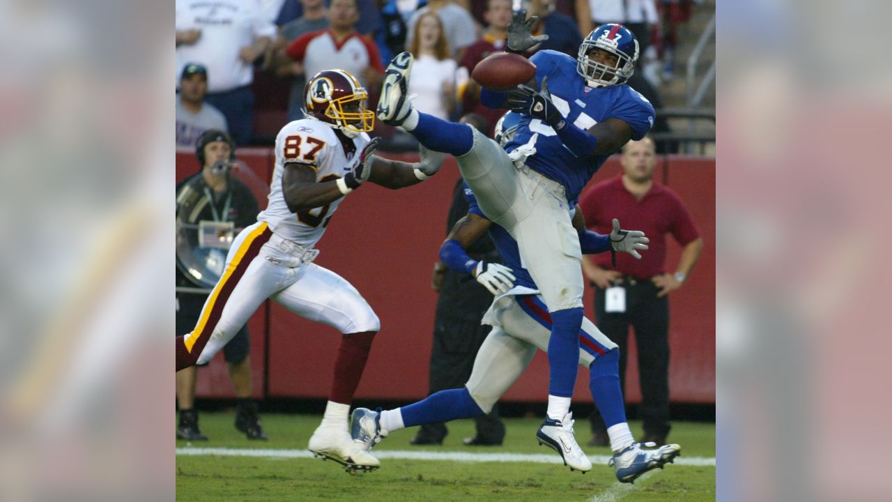 Washington Redskins quarterback Mark Sanchez (6) looks for a receiver in  first quarter action during the game against the New York Giants at FedEx  Field in Landover, Maryland on Sunday, December 9