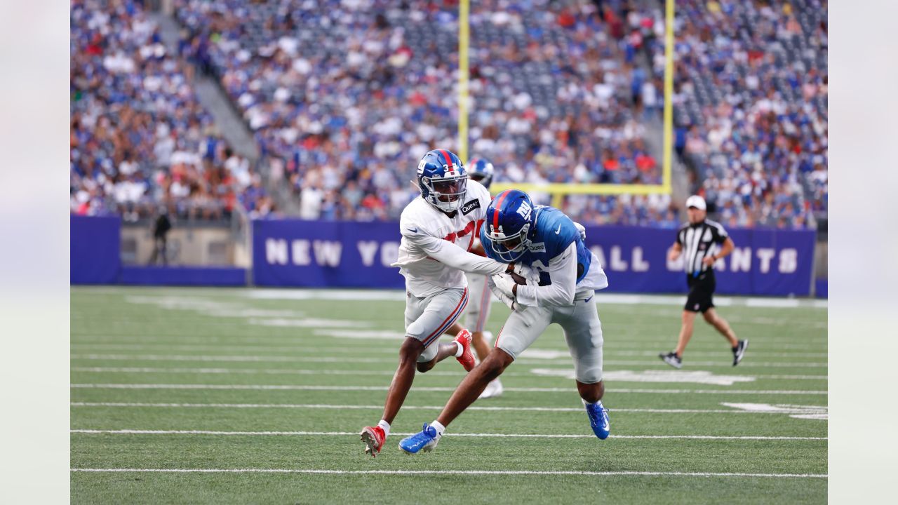 EAST RUTHERFORD, NJ - AUGUST 28: New York Giants safety Yusuf Corker (21)  runs down field during the second quarter of the National Football League  game between the New York Jets and