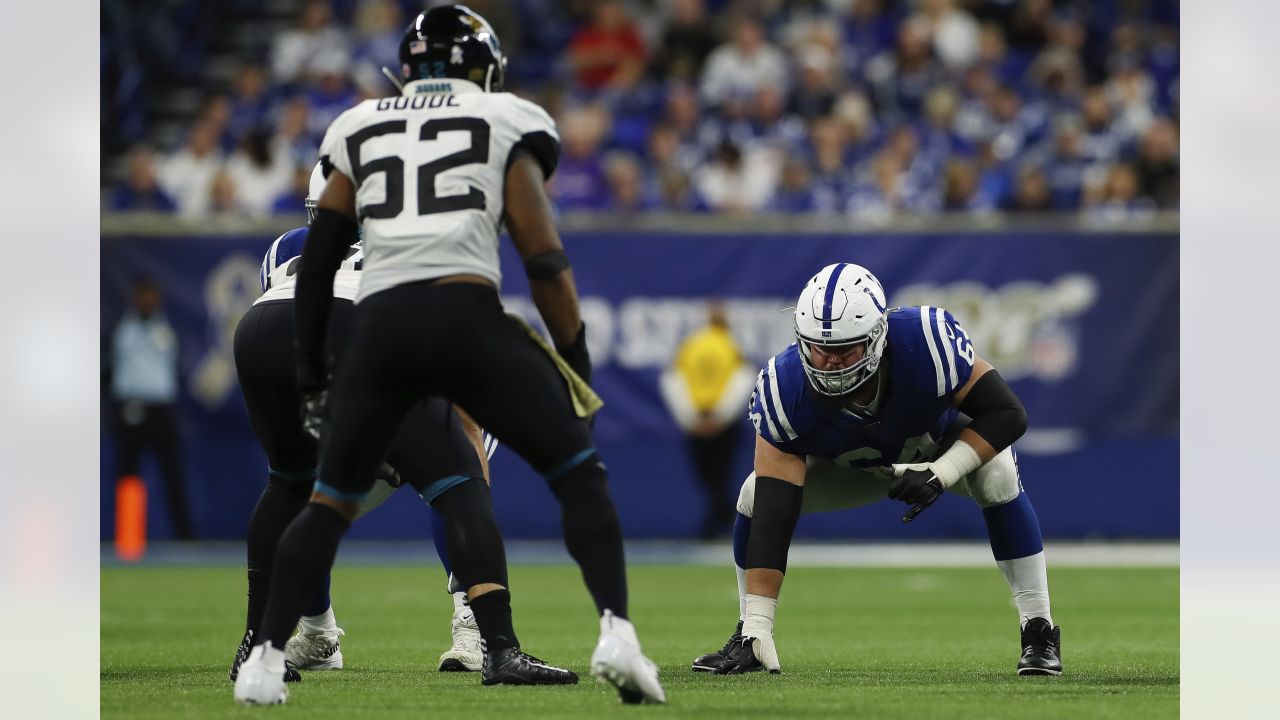 Indianapolis Colts guard Mark Glowinski (64) walks back to the