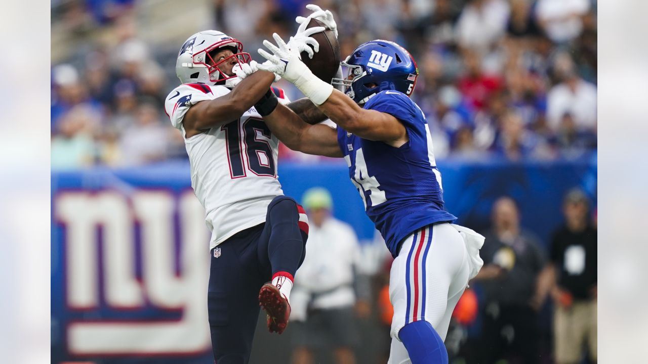 New York Giants inside linebacker Blake Martinez (54) fights for control of  the ball with New England Patriots' Jakobi Meyers (16) during the first  half of an NFL preseason football game Sunday