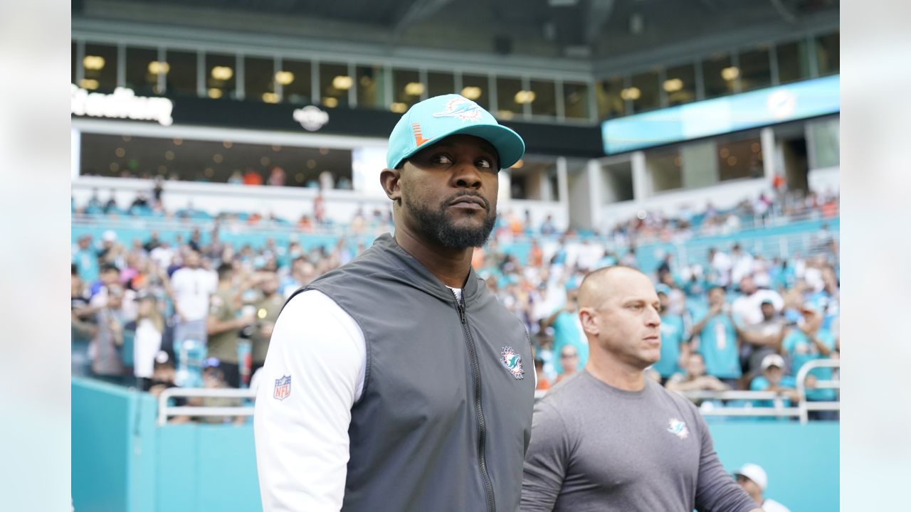 Miami Dolphins guard Michael Deiter (63) heads onto the field for warmups  before the start of a NFL preseason football game against the Las Vegas  Raiders, Saturday, Aug. 20, 2022, in Miami