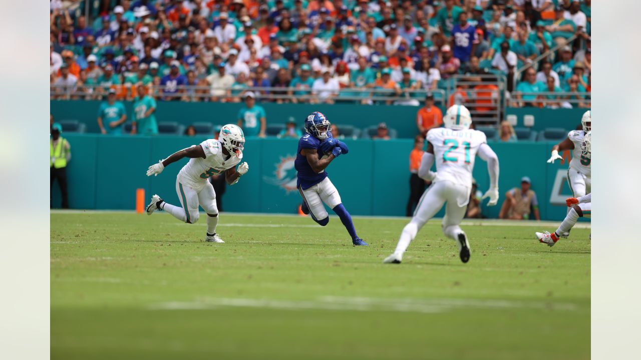 August 19, 2023: Miami Dolphins running back Salvon Ahmed (26) celebrates  his touchdown reception du