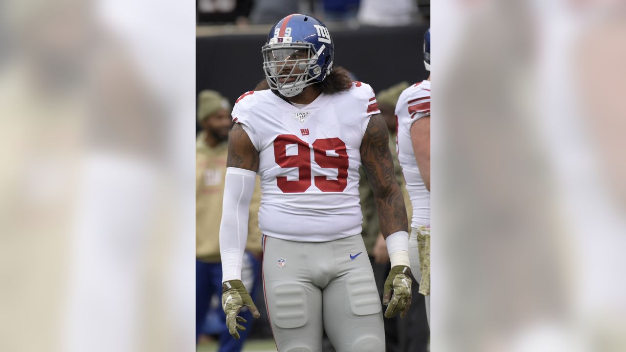 New York Giants defensive end Leonard Williams (99) gets set before a play  during an NFL football game against the Las Vegas Raiders, Sunday, Nov. 7,  2021, in East Rutherford. N.J. The