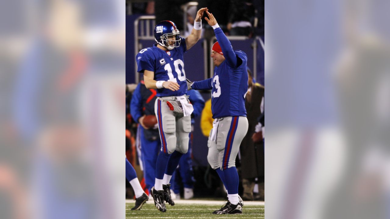 New England Patriots quarterback Doug Flutie is congratulated by