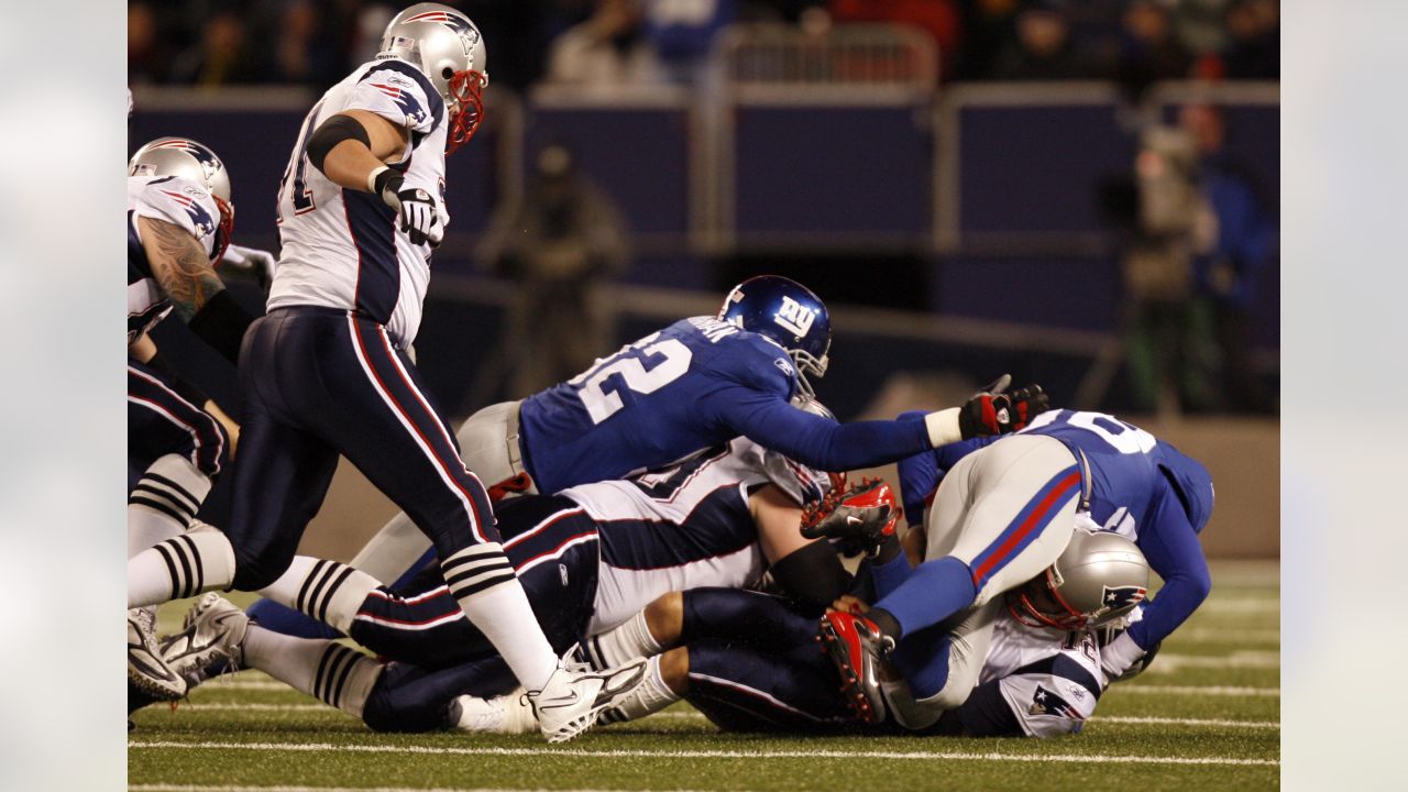 29 December 2007: New England Patriots Tom Brady #12 leaves the field after  the game against the New York Giants at Giants Stadium in East Rutherford,  NJ. The Patriots beat the Giants