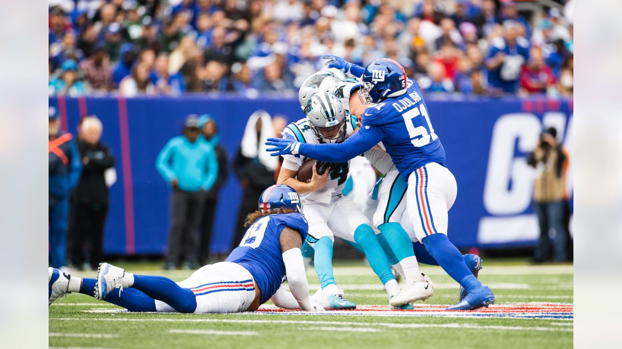 New York Giants defensive end Justin Tuck (91) pumps up the crowd during  second half NFL action in the New York Giants' 31-18 victory over the  Carolina Panthers at New Meadowlands Stadium