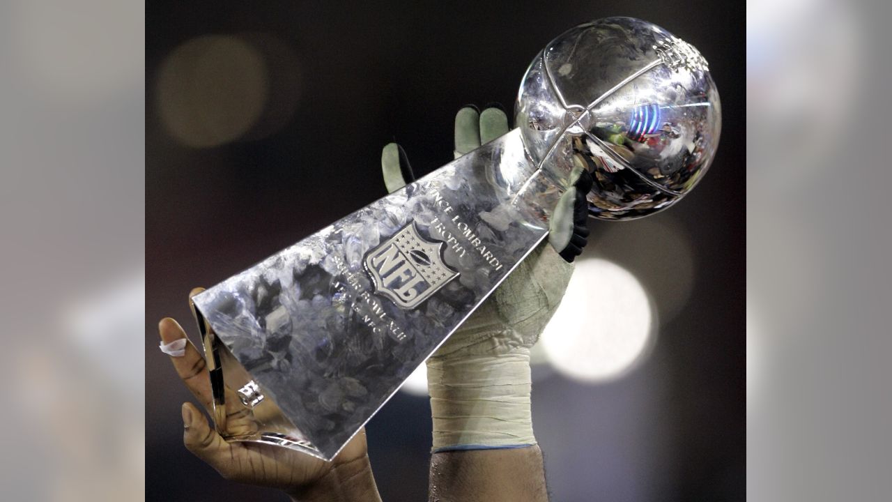 Detailed view of Vince Lombardi Trophy The trophy is trophy awarded each  year to the winning team of the NFL championship game Super Bowl between  the AFC and the NFC. (Kirby Lee