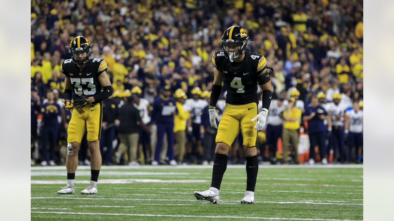 Iowa defensive back Dane Belton (4) gets set for a play during an NCAA  college football game against Kent State, Saturday, Sept. 18, 2021, in Iowa  City, Iowa. (AP Photo/Charlie Neibergall Stock