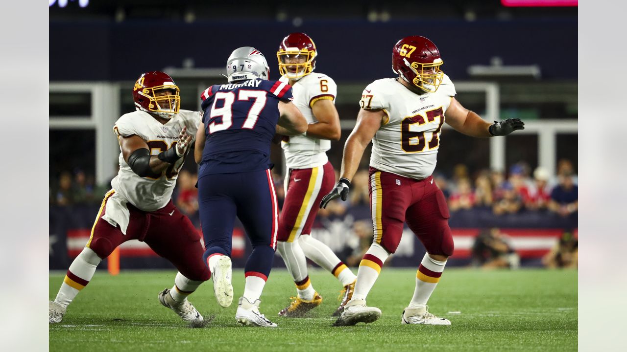 The Washington Football Team helmet of Chase Young is seen during an NFL  preseason football game against the New England Patriots at Gillette  Stadium, Thursday, Aug. 12, 2021 in Foxborough, Mass. (Winslow