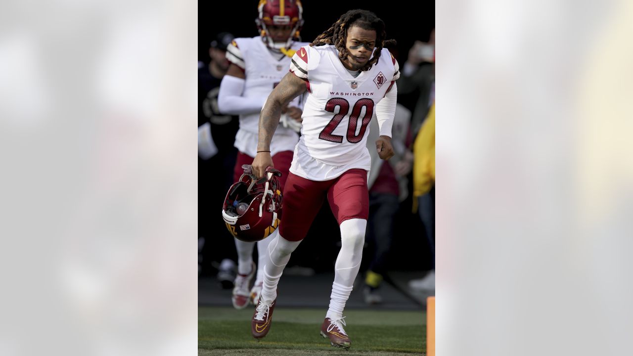 Washington Commanders safety Terrell Burgess (24) runs during an