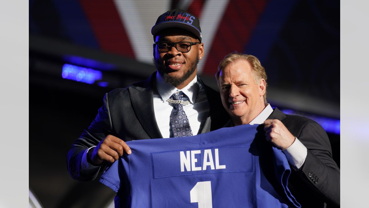 North Carolina State offensive tackle Ikem Ekwonu stands with NFL  Commissioner Roger Goodell after being picked by the Carolina Panthers with  the sixth pick of the NFL football draft Thursday, April 28