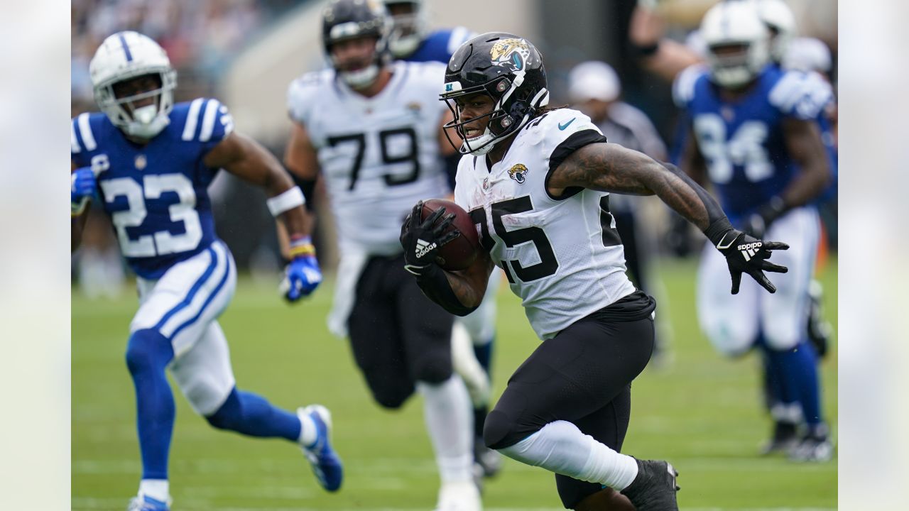 Jacksonville Jaguars running back James Robinson (25) runs the ball for a  touchdown during the first half of an NFL football game against the  Indianapolis Colts, Sunday, Sept. 18, 2022, in Jacksonville