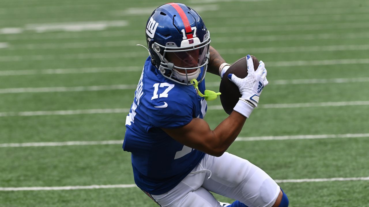 New York Giants safety Dane Belton (24) and linebacker Tomon Fox