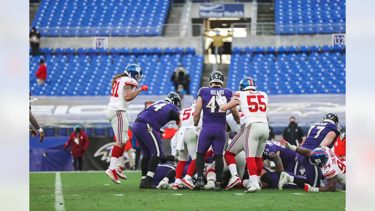 Baltimore, United States. 27th Dec, 2020. New York Giants quarterback  Daniel Jones (8) leaves the field with tight end Kaden Smith (82) after a  game against the Baltimore Ravens at M&T Bank