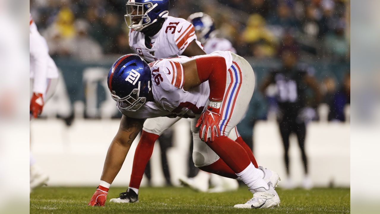 New York Giants defensive tackle Dexter Lawrence (97) takes the field for  an NFL football game against the Philadelphia Eagles on Sunday, Dec. 11,  2022, in East Rutherford, N.J. (AP Photo/Adam Hunger